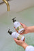 Cream Fig Leaf hand and body duo by aery held inland's over bubble bath 